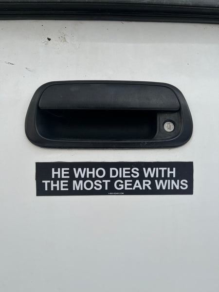 He Who Dies With The Most Gear Wins Bumper Sticker